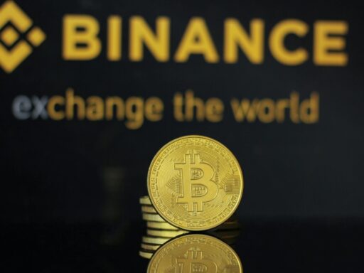 Closeup of bitcoin coin with binance logo