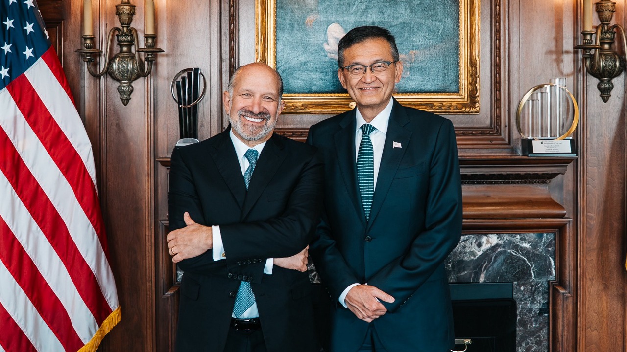 Howard with Intel CEO Lip