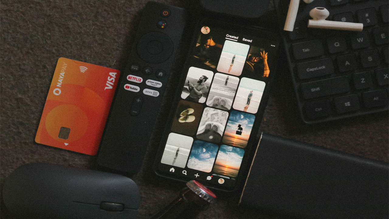 Nayapay credit card a remote control and a smartphone