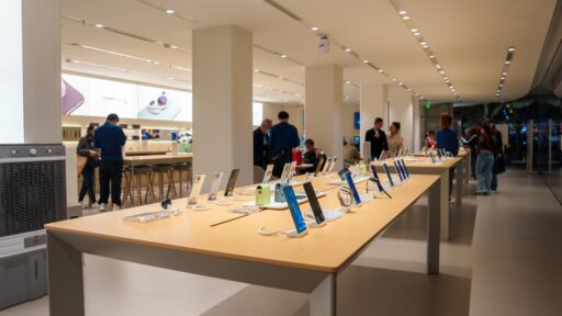 interior of modern electronics store in shingai with customers