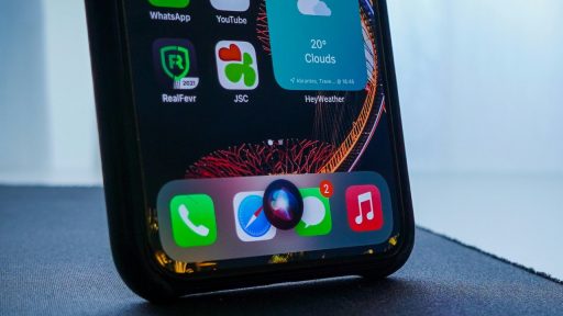 Iphone with siri on a black table