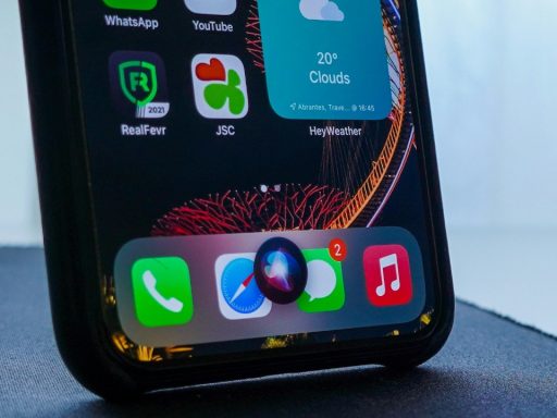 Iphone with siri on a black table