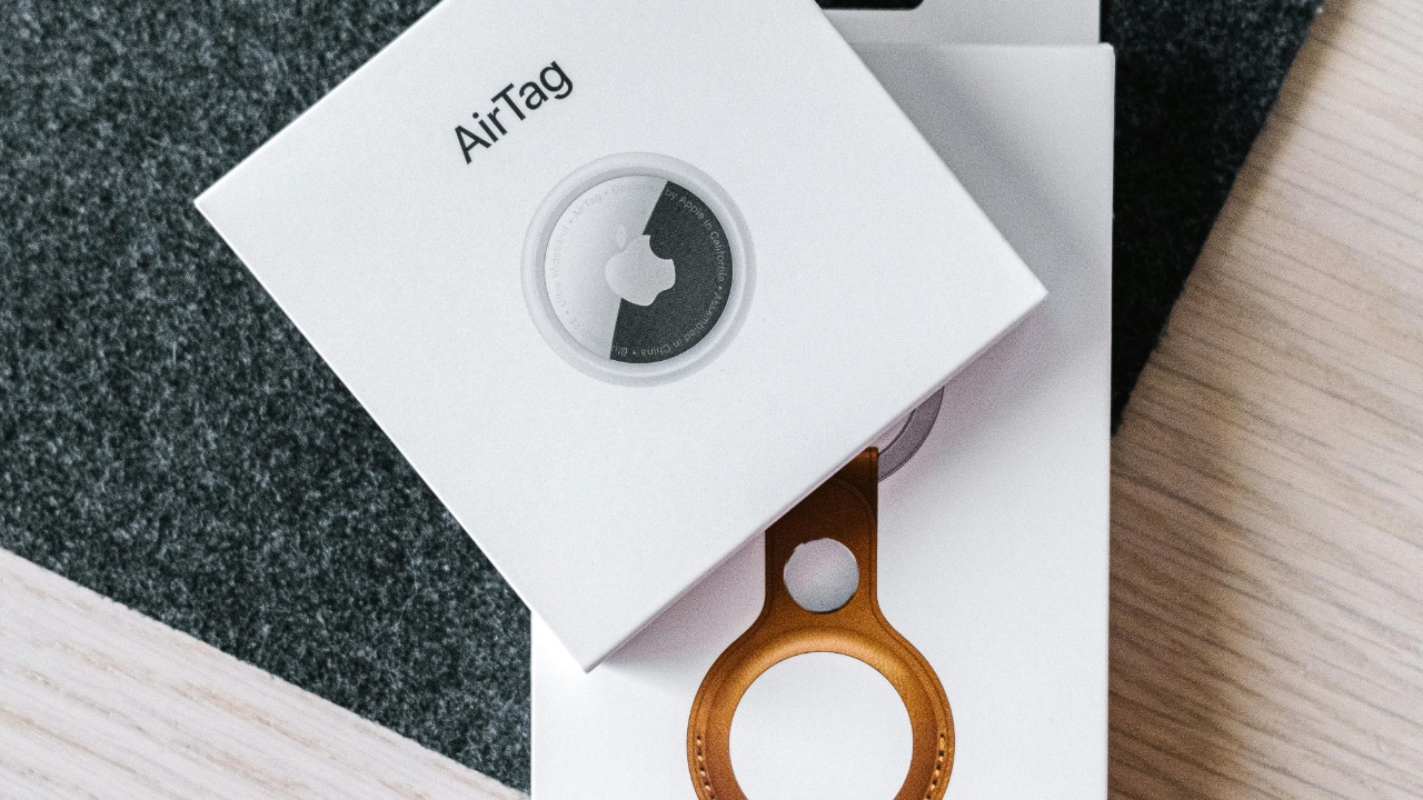 Overhead shot of air tag and leather key ring