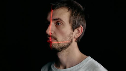 a man undergoes a facial recognition