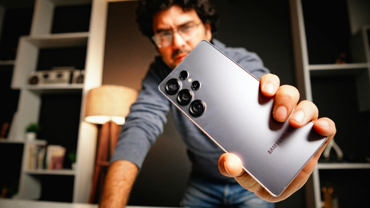 a person displaying Samsung S24 smartphone