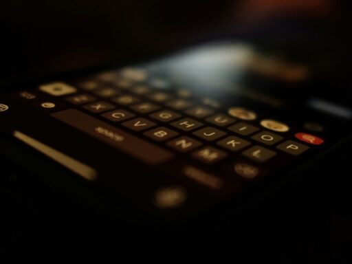 black qwerty phone turn on in dark room