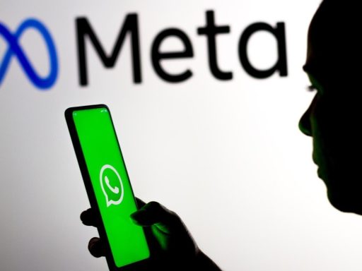 women holding phone opening whatsapp app